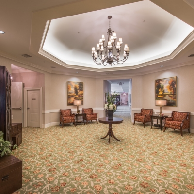 lobby space with chandelier and chairs