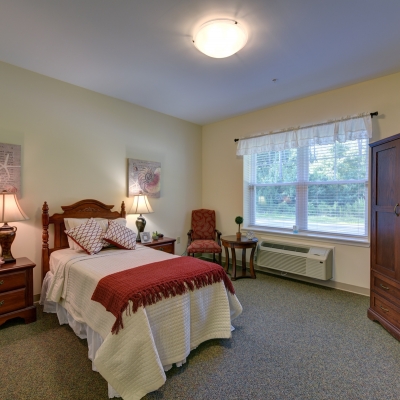 bedroom with twin bed in assisted living space