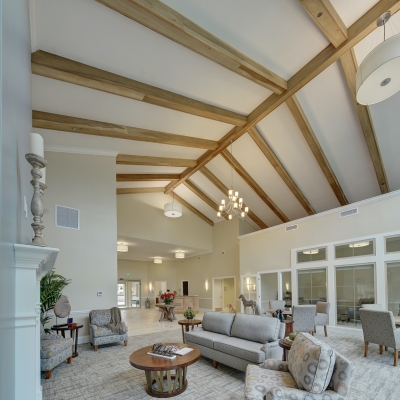 grand lobby with wood beams and vaulted ceiling