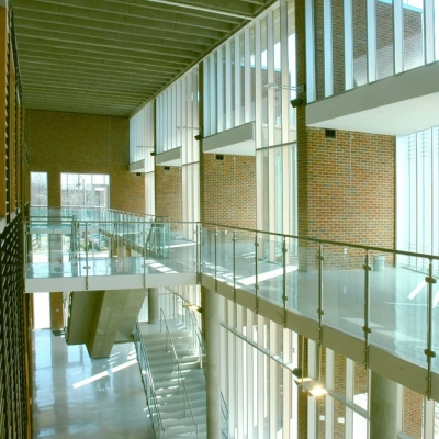 university lobby with stairs and glass windows